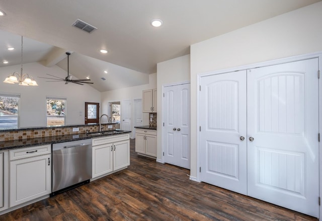 kitchen with dishwasher, sink, lofted ceiling with beams, backsplash, and ceiling fan with notable chandelier