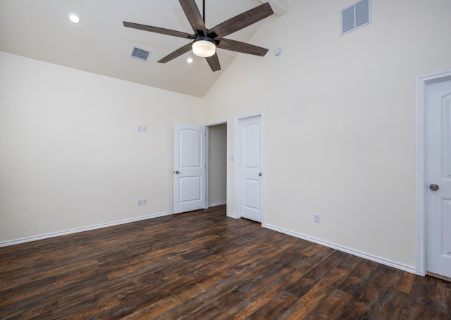 unfurnished bedroom featuring ceiling fan, dark hardwood / wood-style flooring, and high vaulted ceiling