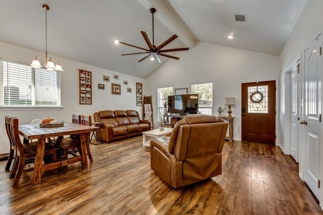 living room featuring beamed ceiling, wood-type flooring, ceiling fan with notable chandelier, and high vaulted ceiling