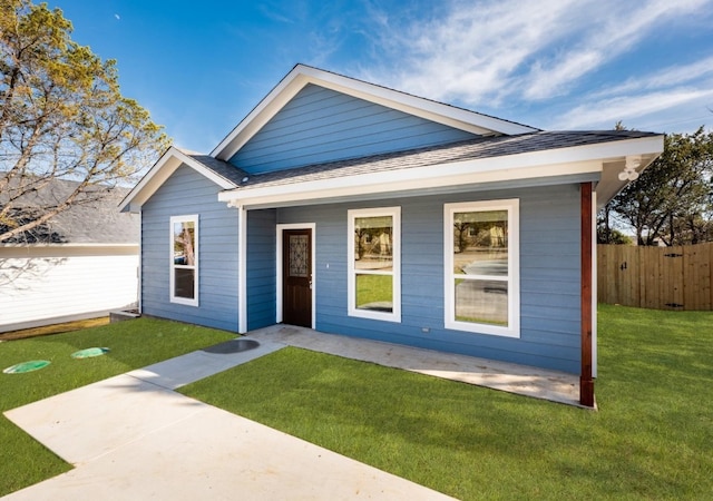 view of front facade with a porch and a front yard