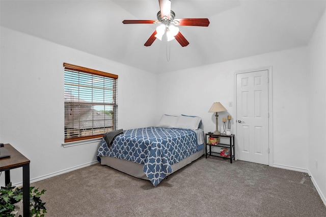 bedroom featuring baseboards, carpet, and a ceiling fan