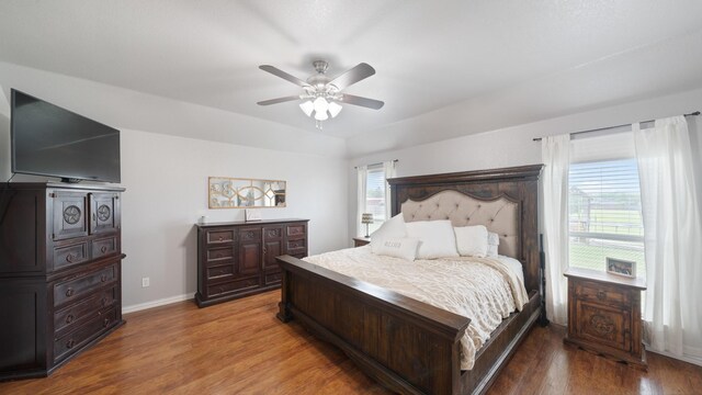 bedroom featuring ceiling fan and hardwood / wood-style floors