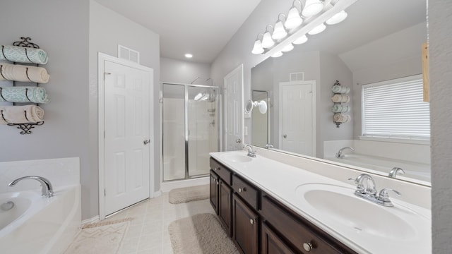 bathroom with tile patterned flooring, shower with separate bathtub, vanity, and lofted ceiling