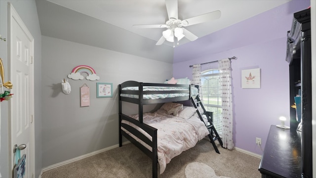 bedroom with ceiling fan and carpet floors