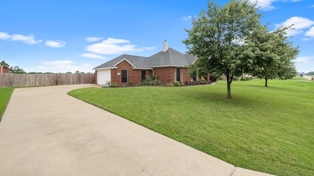 ranch-style home featuring a front yard and a garage