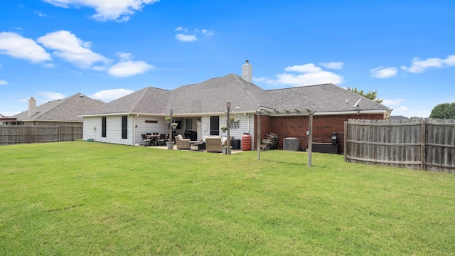 rear view of property with an outdoor living space, cooling unit, a yard, and a patio