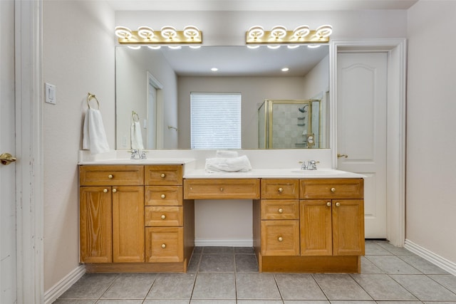 bathroom with walk in shower, tile patterned floors, and vanity