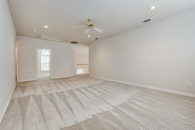 carpeted empty room with ceiling fan