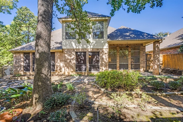 back of property featuring a patio and ceiling fan