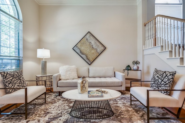 living room featuring hardwood / wood-style floors and ornamental molding