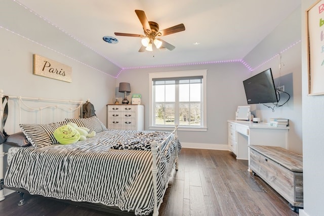 bedroom with wood-type flooring, vaulted ceiling, and ceiling fan