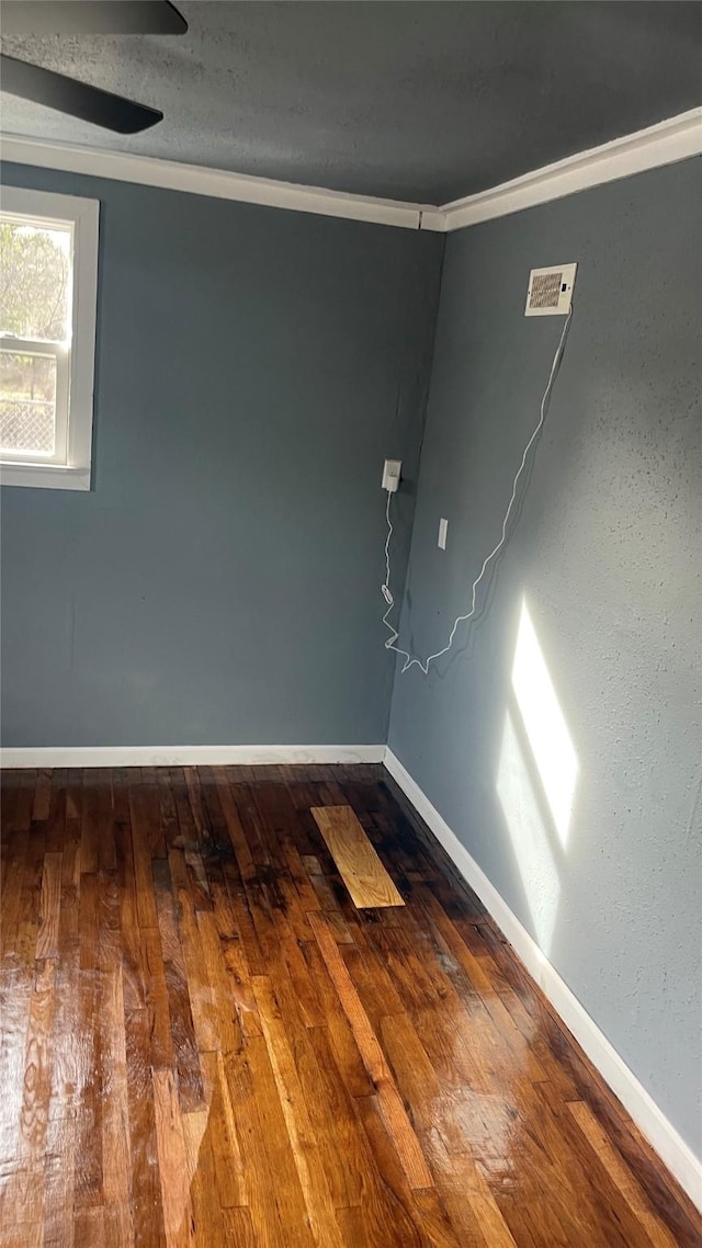 unfurnished room with wood-type flooring, ceiling fan, and crown molding