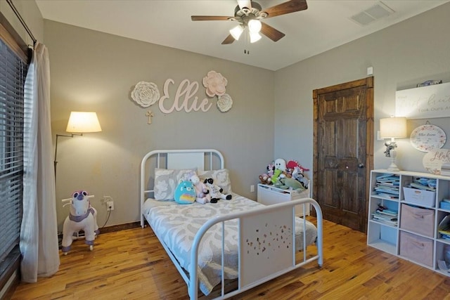 bedroom featuring ceiling fan and light wood-type flooring