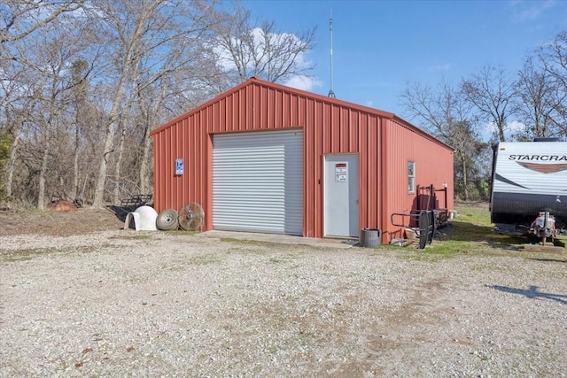 view of outdoor structure with a garage