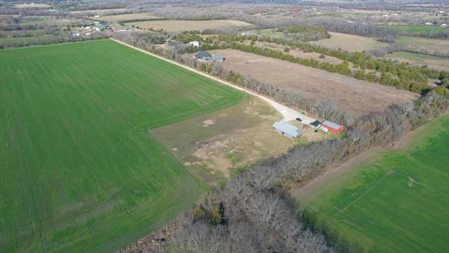 birds eye view of property featuring a rural view