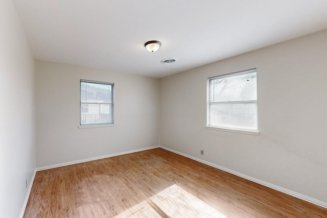 empty room featuring light hardwood / wood-style floors