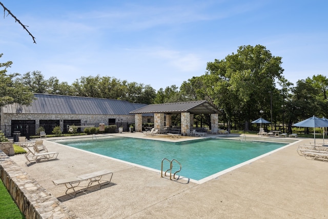 view of pool with a gazebo and a patio