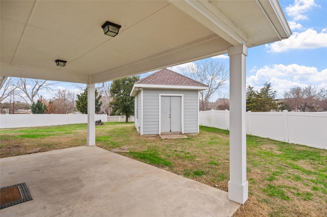 view of patio featuring a shed