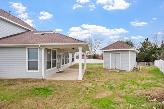 view of yard with a patio area and a shed