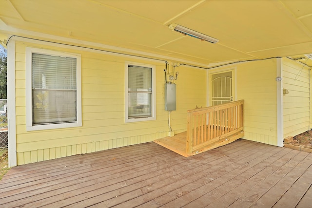 wooden terrace featuring water heater