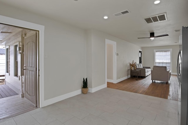 interior space featuring visible vents, recessed lighting, a ceiling fan, and baseboards