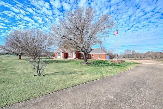 view of front of property with a front lawn