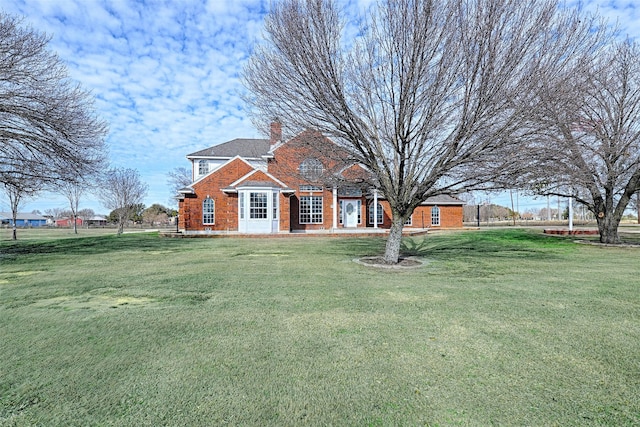 exterior space featuring a front lawn