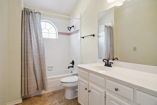 full bathroom featuring shower / tub combo, vanity, and toilet