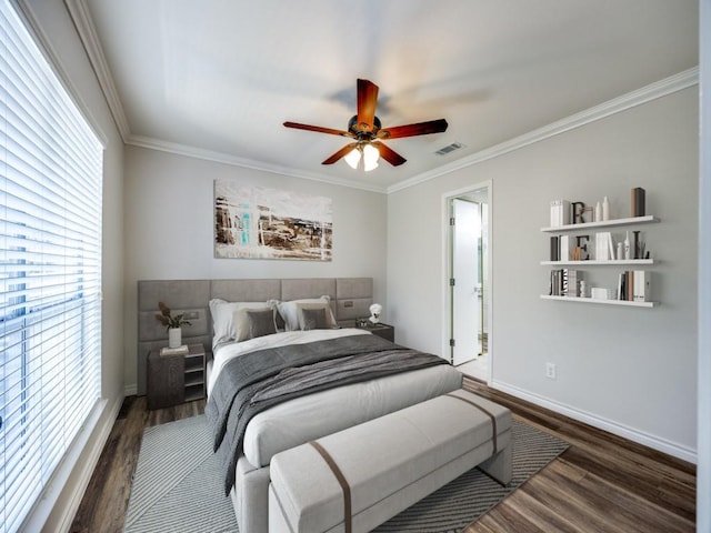 bedroom with ceiling fan, dark hardwood / wood-style flooring, and ornamental molding