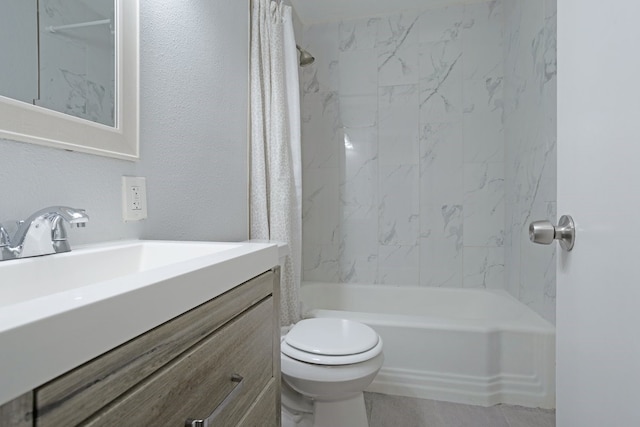 full bathroom featuring shower / bath combo, toilet, and vanity