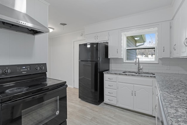 kitchen featuring tasteful backsplash, sink, black appliances, exhaust hood, and white cabinetry