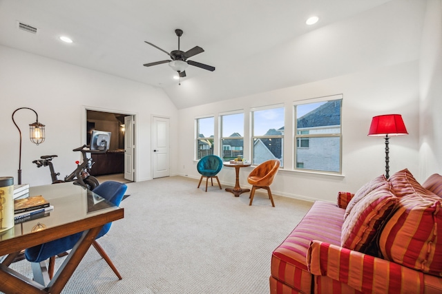 carpeted office space featuring ceiling fan and lofted ceiling