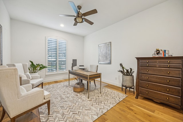 home office featuring ceiling fan and light wood-type flooring