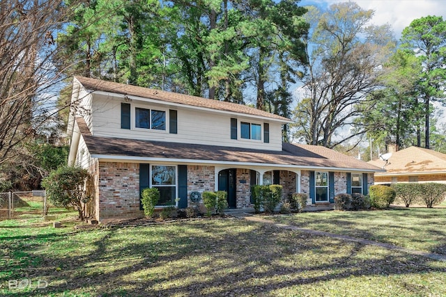 view of front of home featuring a front yard