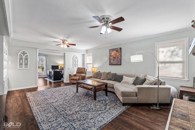 living room featuring ceiling fan, dark hardwood / wood-style floors, and ornamental molding