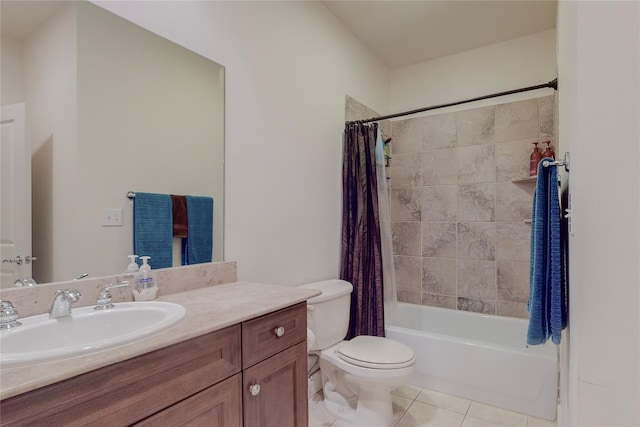 full bathroom featuring tile patterned flooring, vanity, toilet, and shower / bath combo with shower curtain