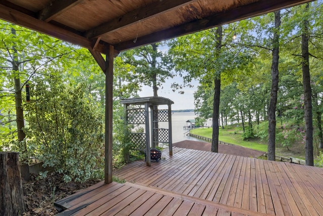 wooden terrace with a water view