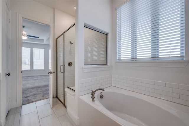 bathroom featuring tile patterned flooring, ceiling fan, and shower with separate bathtub