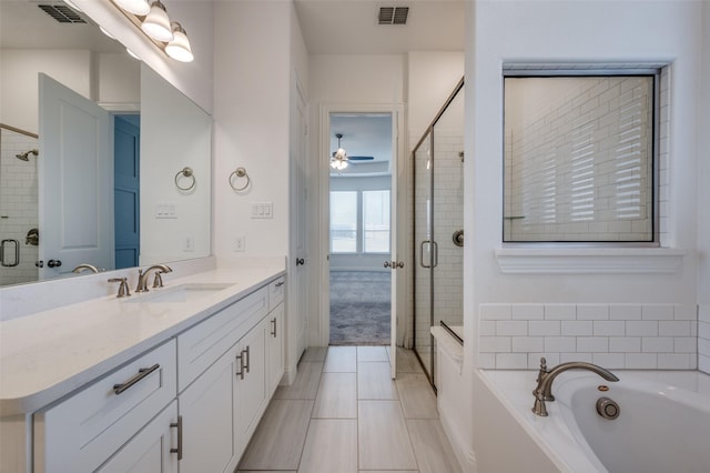 bathroom with vanity, tile patterned floors, ceiling fan, and separate shower and tub