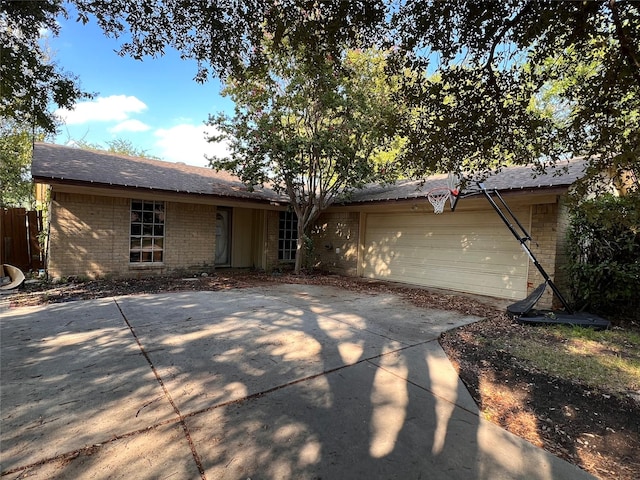 single story home with a garage