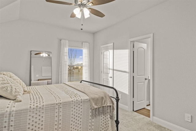 bedroom with light colored carpet and ceiling fan