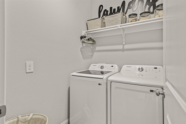 laundry area featuring washer and clothes dryer