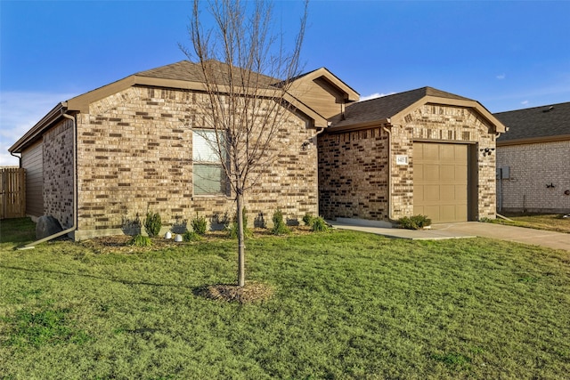 view of front of house featuring a garage and a front yard