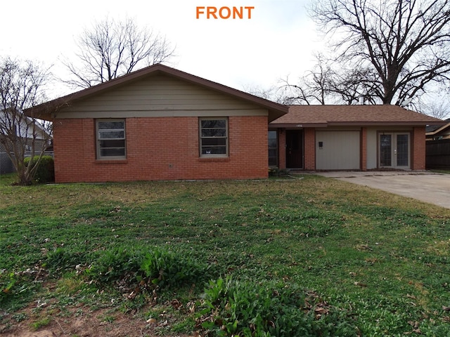 single story home with french doors and a front lawn