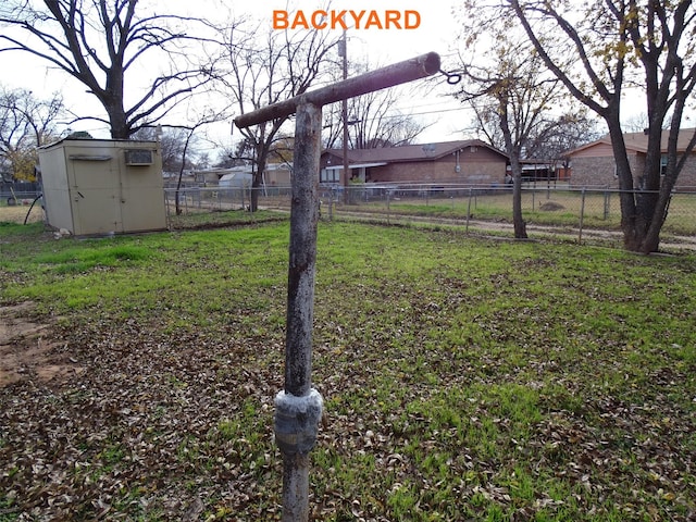 view of yard with a storage shed