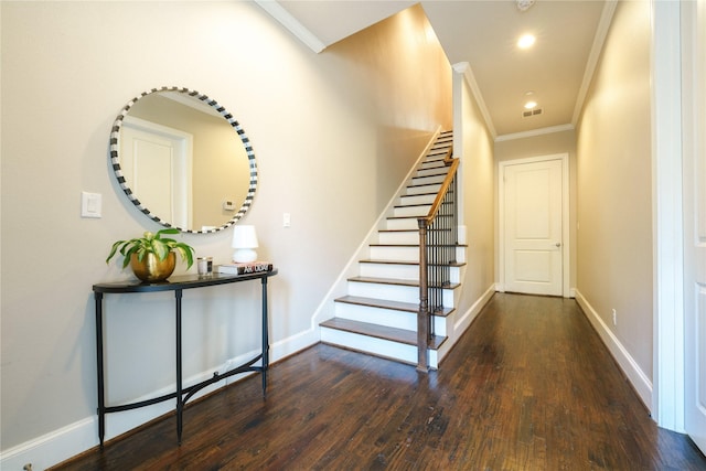 stairway featuring hardwood / wood-style flooring and ornamental molding