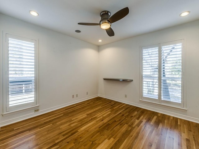 unfurnished room featuring hardwood / wood-style flooring and ceiling fan