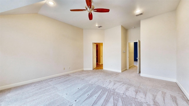 unfurnished room featuring ceiling fan, high vaulted ceiling, and light colored carpet