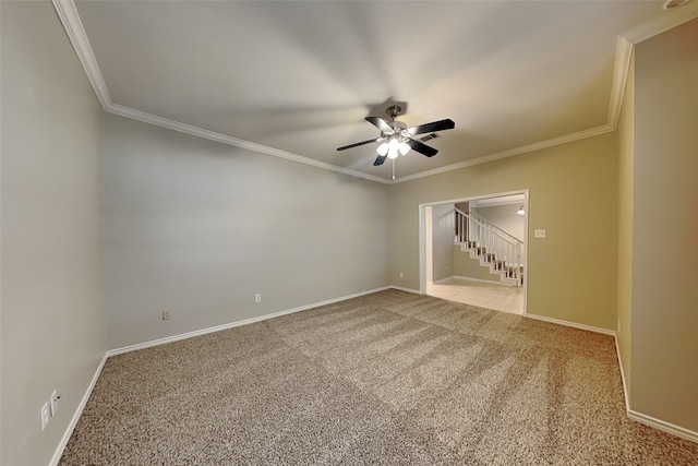 unfurnished room with light carpet, ceiling fan, and crown molding