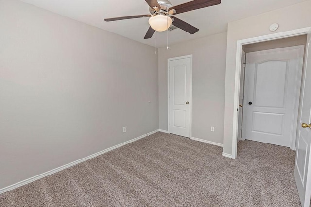 5400 Belle Chasse Ln, Frisco, TX 75035 - unfurnished bedroom featuring carpet flooring, baseboards, and a ceiling fan